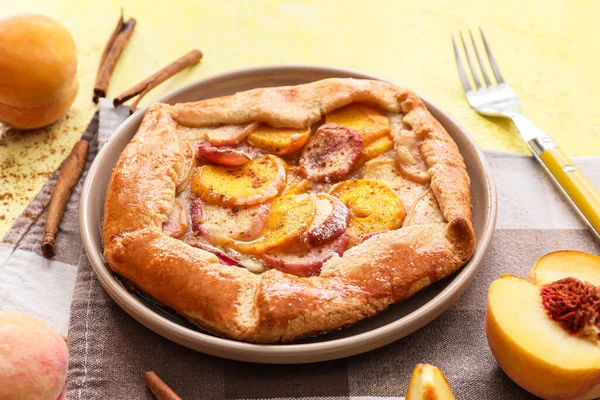 Plate Tasty Peach Galette Cinnamon Color Background Closeup — Stock Photo, Image