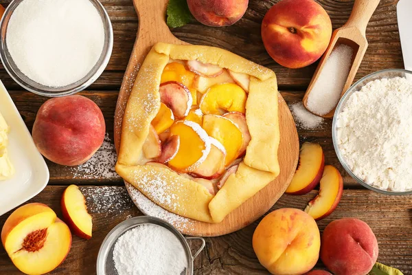 Board Raw Peach Galette Wooden Background — Stock Photo, Image