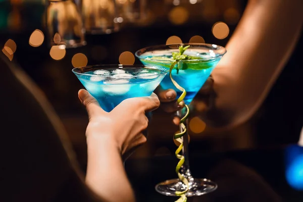 Women Clinking Glasses Blue Lagoon Cocktail Table Bar — Stock Photo, Image