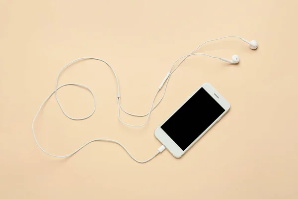 Mobile Phone Earphones Beige Background — Stock Photo, Image