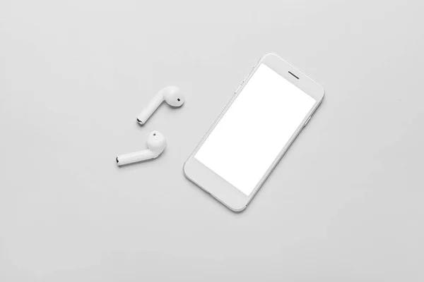 Modern Mobile Phone Earphones Grey Background — Stock Photo, Image