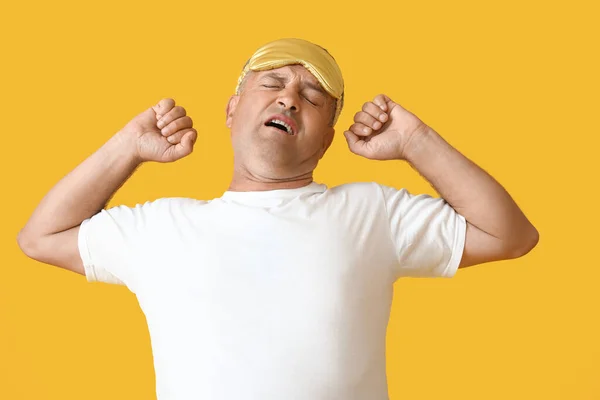 Yawning Mature Man Sleep Mask Color Background — Stock Photo, Image