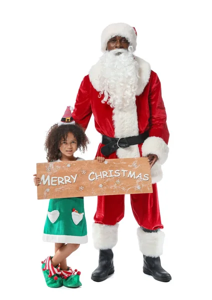 Święty Mikołaj Dziewczynka Trzyma Deskę Tekstem Merry Boże Narodzenie Białym — Zdjęcie stockowe