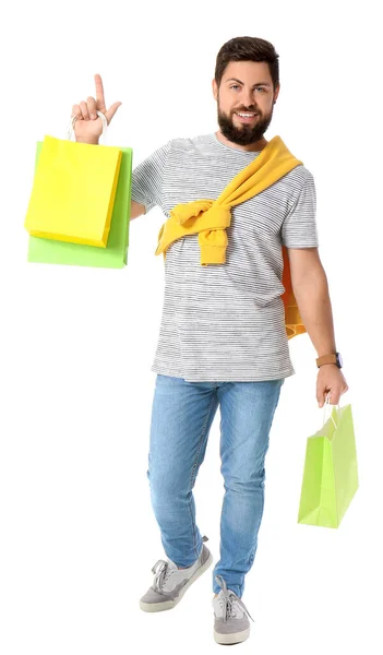 Hombre Guapo Con Bolsas Compras Viernes Negro Apuntando Algo Sobre —  Fotos de Stock