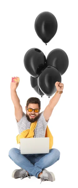 Handsome Man Credit Card Laptop Balloons White Background Black Friday — Stock Photo, Image