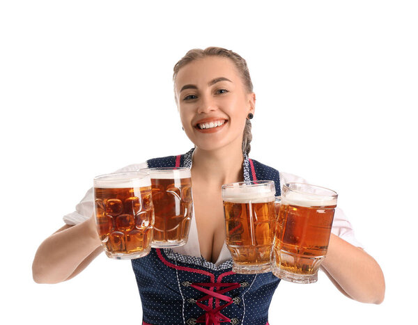 Young Octoberfest waitress with beer on white background