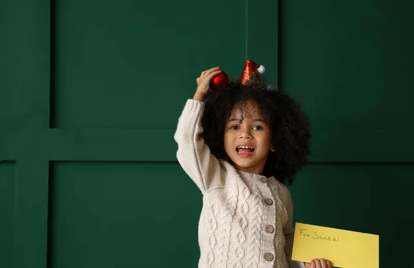 Cute African American Girl Letter Santa Color Background — Stock Photo, Image