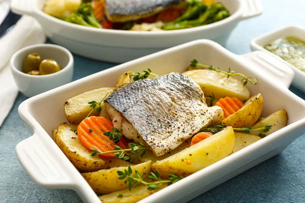 Baking Dish Tasty Sea Bass Fish Vegetables Blue Background — Stock Photo, Image