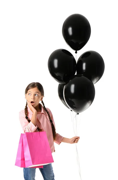 Surprised Little Girl Black Friday Shopping Bags Balloons White Background — Stock Photo, Image