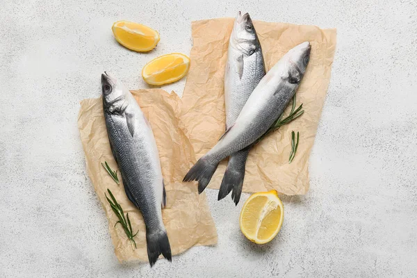 Fresh Uncooked Sea Bass Fish Lemon Light Background — Stock Photo, Image