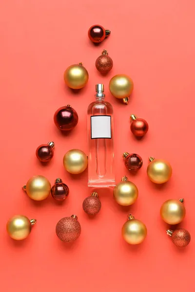 Christmas Tree Made Perfume Bottle Balls Red Background — Stock Photo, Image