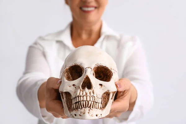 Woman Holding Human Skull White Background — Stock Photo, Image