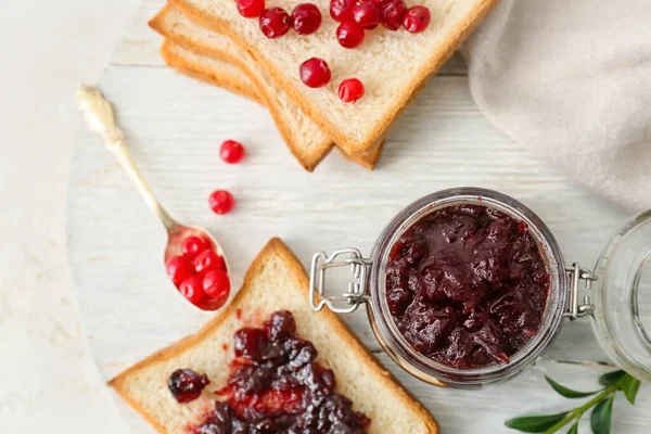 Jar Tasty Lingonberry Jam Toasts White Background — Stock Photo, Image