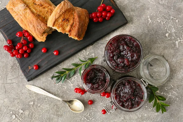 Jars Tasty Lingonberry Jam Bread Grey Background — Stock Photo, Image
