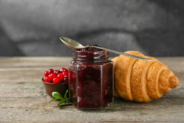 Jar Tasty Lingonberry Jam Fresh Berries Croissant Table — Stock Photo, Image