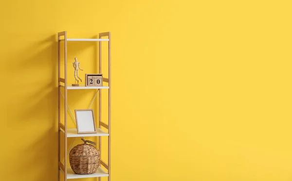 Modern Shelf Unit Decor Yellow Background Closeup — Stock Photo, Image