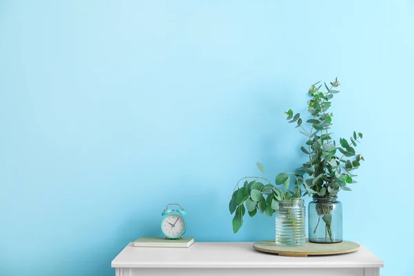 Vases Eucalyptus Branches Alarm Clock Table Blue Wall — Stock Photo, Image