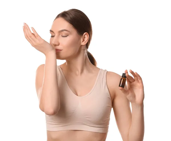 Woman Smelling Essential Oil White Background — Stock Photo, Image