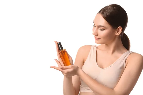 Young Woman Bottle Essential Oil White Background — Stock Photo, Image