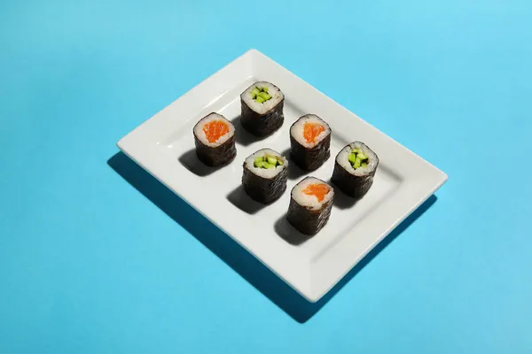 Plate Different Delicious Maki Sushi Color Background — Stock Photo, Image