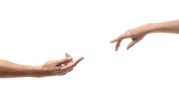 Woman and man reaching out to each other on white background