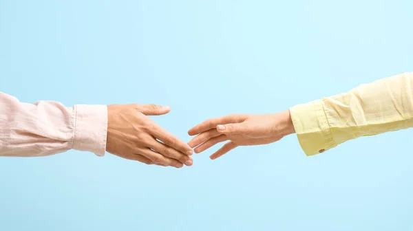 Man Woman Reaching Out Handshake Blue Background — Stock Photo, Image