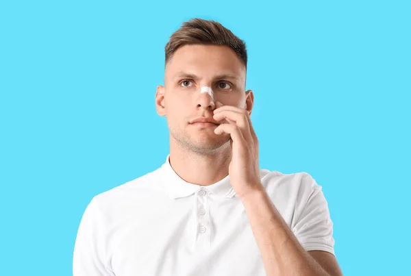 Man Medical Patch His Nose Color Background — Stock Photo, Image