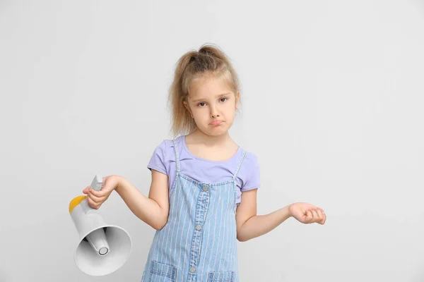 Confused Little Girl Megaphone Light Background — Stock Photo, Image