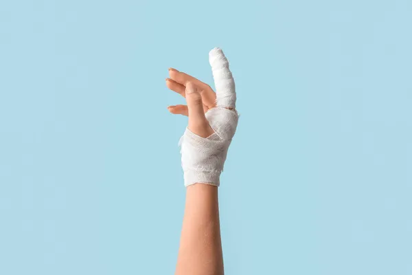 Female Hand Bandaged Forefinger Color Background — Stock Photo, Image