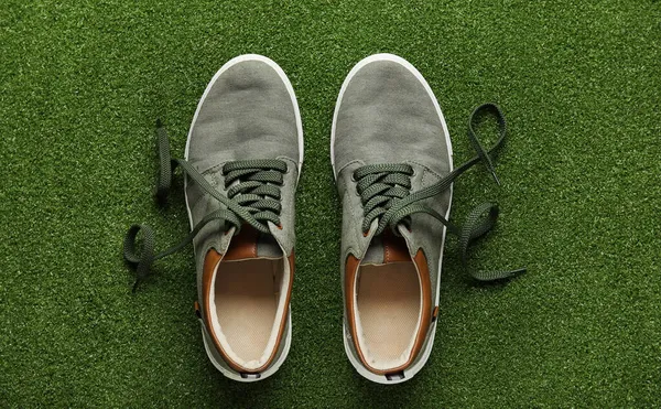 Pair Casual Shoes Untied Laces Color Background — Stock Photo, Image