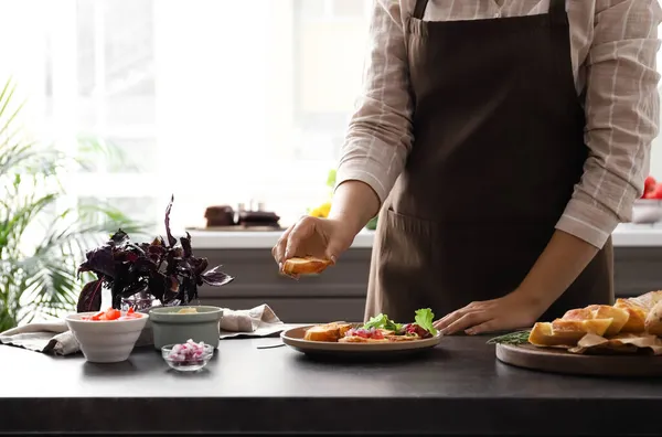 Woman Cooking Delicious Vegetarian Bruschettas Table Kitchen — Stock Photo, Image