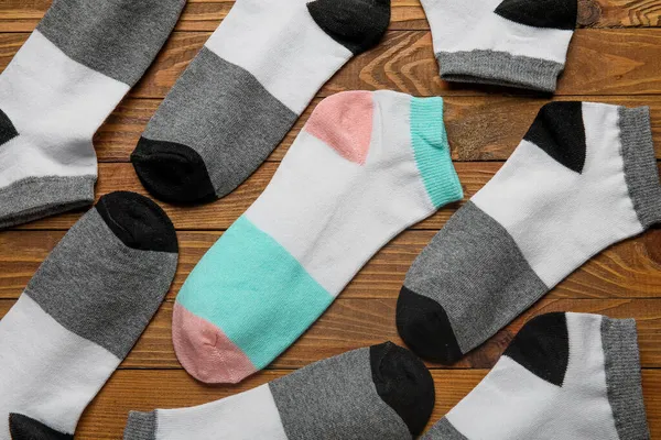 Many Socks Wooden Background Concept Uniqueness Closeup — Stock Photo, Image