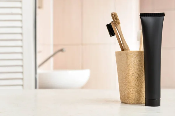 Black Toothpaste Activated Carbon Brushes Table Bathroom — Stock Photo, Image