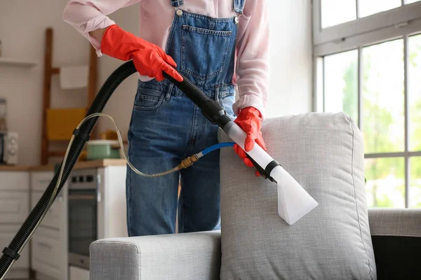 Woman Removing Dirt Grey Sofa Vacuum Cleaner Home — Stock Photo, Image