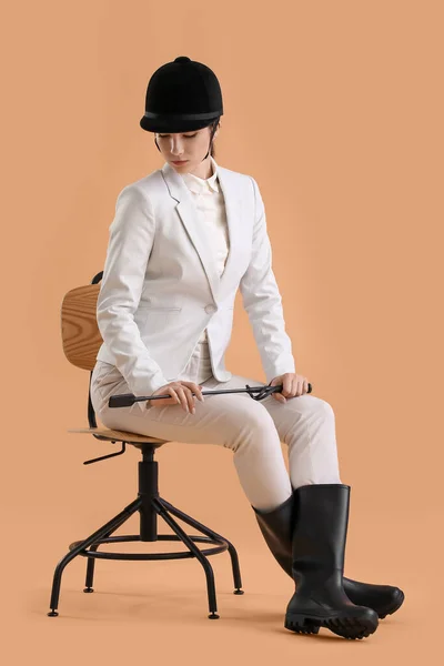 Beautiful Female Jockey Sitting Chair Color Background — Stock Photo, Image