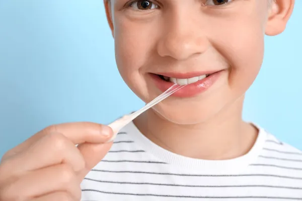 Little Boy Chewing Gum Blue Background Closeup — Stock Photo, Image