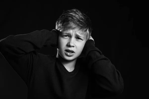 Upset Little Boy Closing Ears Black Background — Stock Photo, Image