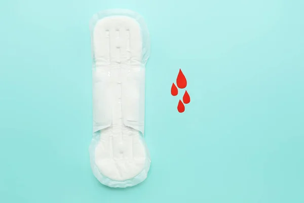 Almofada Menstrual Gotas Sangue Papel Fundo Azul — Fotografia de Stock
