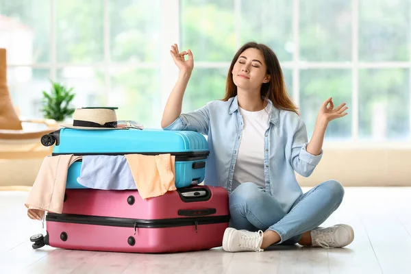 Young Woman Suitcases Meditating Home — Stock Photo, Image
