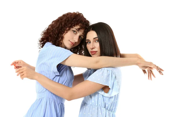 Beautiful Young Sisters Hugging White Background — Stock Photo, Image