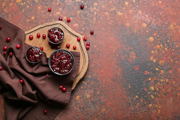 Bowls Tasty Cranberry Jam Grunge Background — Stock Photo, Image