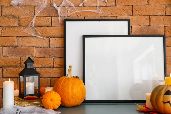 Blank Frames Halloween Decor Table Brick Wall — Stock Photo, Image