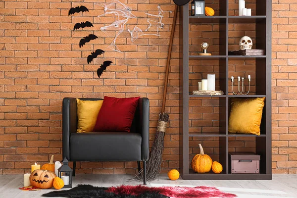 Cozy Armchair Shelving Unit Halloween Decor Brick Wall — Stock Photo, Image