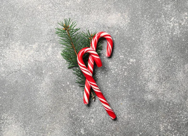 Sweet Candy Canes Fir Branch Grunge Background — Stock Photo, Image