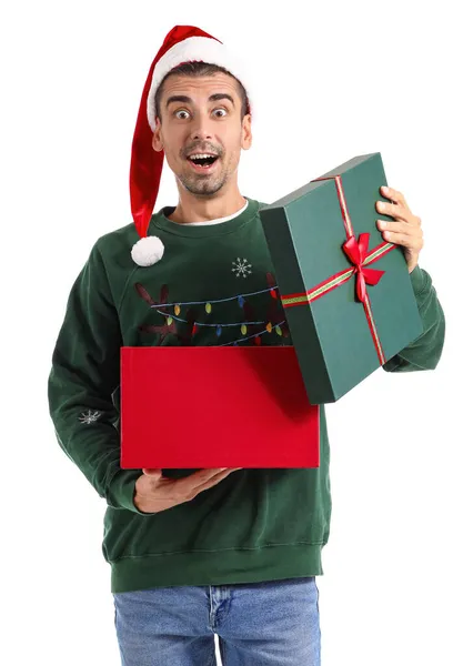 Surprised Young Man Santa Hat Opening Christmas Present White Background — Stock Photo, Image