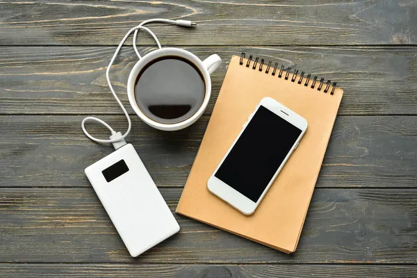 Modern Power Bank Cup Coffee Notebook Mobile Phone Wooden Background — Stock Photo, Image