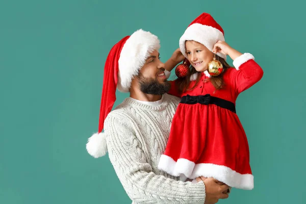Little Girl Her Father Santa Hats Color Background — Stock Photo, Image