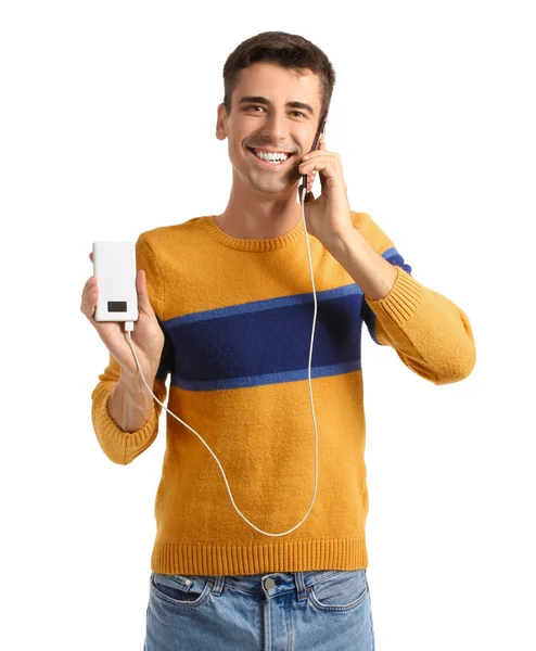 Jeune Homme Avec Téléphone Banque Alimentation Sur Fond Blanc — Photo