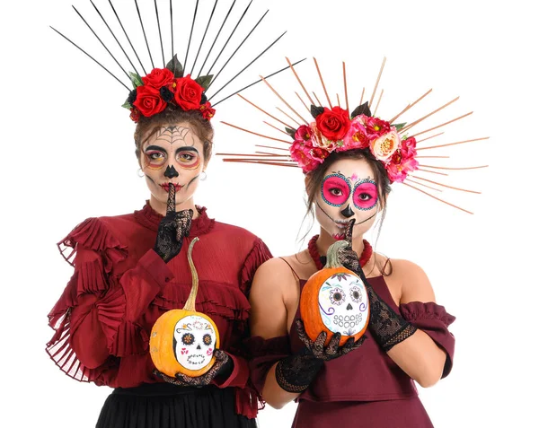 Stylish Women Painted Skull Faces Pumpkins Showing Silence Gesture White — Stock Photo, Image