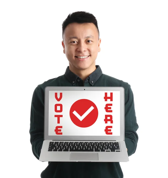 Young Asian Man Holding Laptop Text Vote Here Screen White — Stock Photo, Image